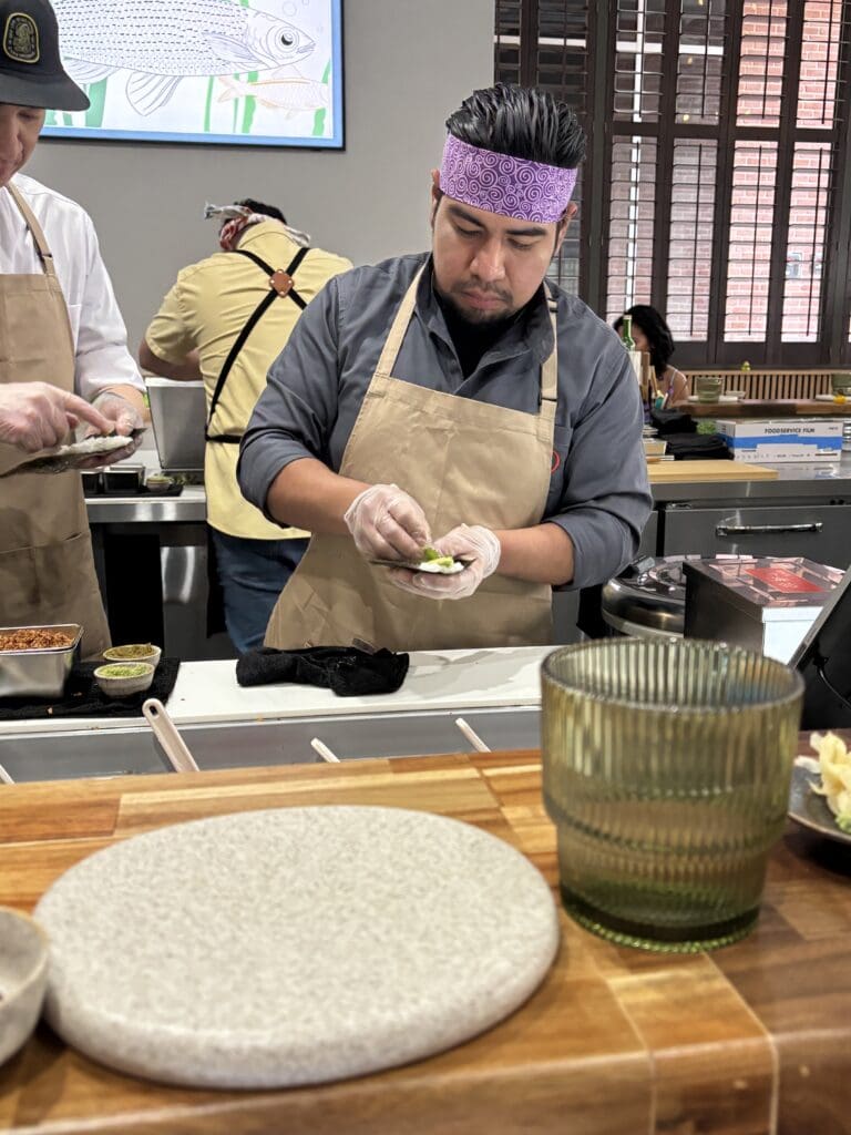 Handrolls are created bar-side at Kokoro's newest location on The Waterway in The Woodlands. (Photo by Laura Landsbaum)