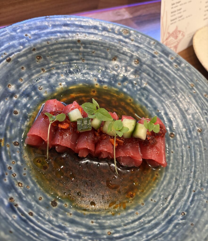 Maguro crudo with bluefin tuna, pickled cucumber, chili garlic and ponzu sauce. (Photo by Laura Landsbaum)