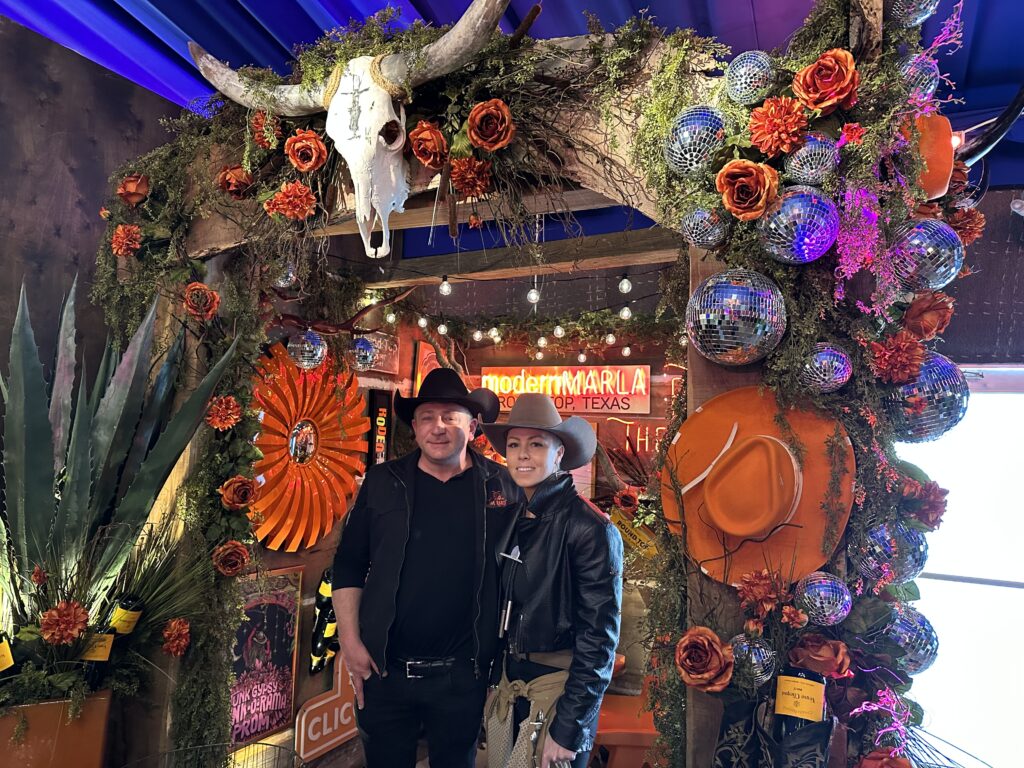 Ben Berg, cowboy artist Lauren Goodson at Berg Hospitality Group's The Ranch + Steakhouse at the Houston Livestock Show & Rodeo (Photo by Shelby Hodge)