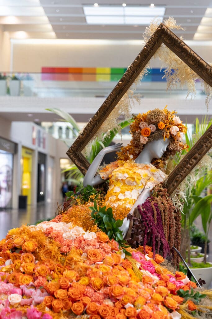 A floral interpretation by Sage Fine Flowers of "Flaming June" on display at Meadows Museum (Photo by NorthPark Center)