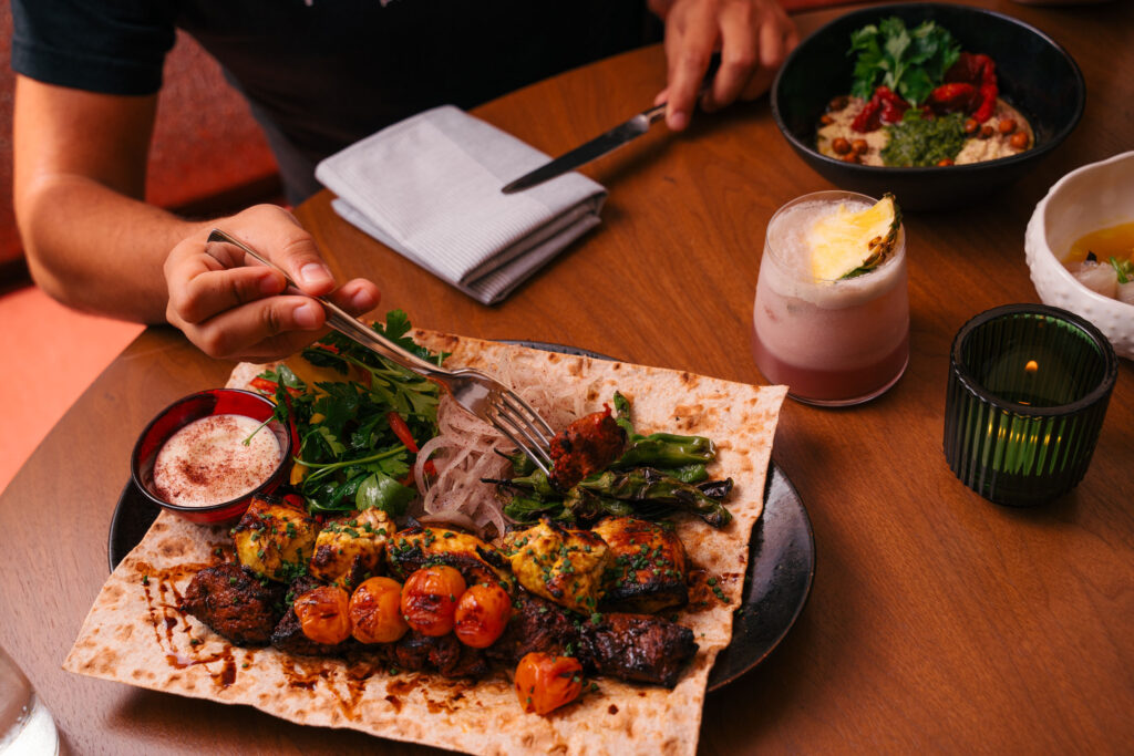 Lola Rose serves a Mezze-style menu of kebabs, greens, spreads, and more.