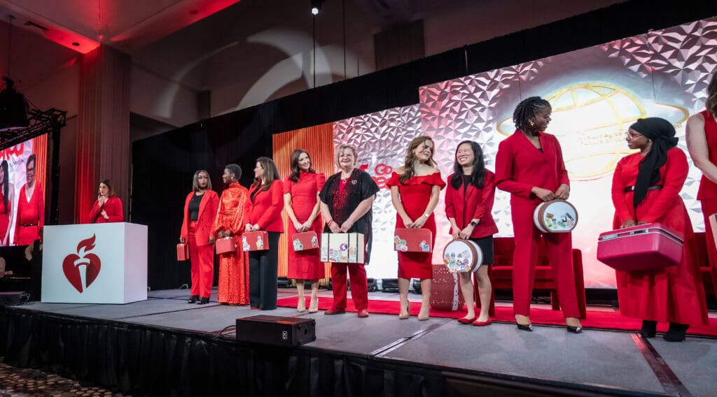 Survivors and volunteers at the Go Red for Women luncheon. (Photo by Cash Anglin Photography)