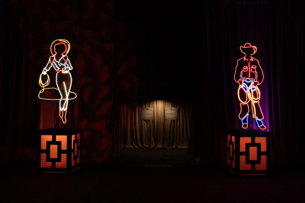 Neon signs lit up the room. (Photo by Danette Adelson)