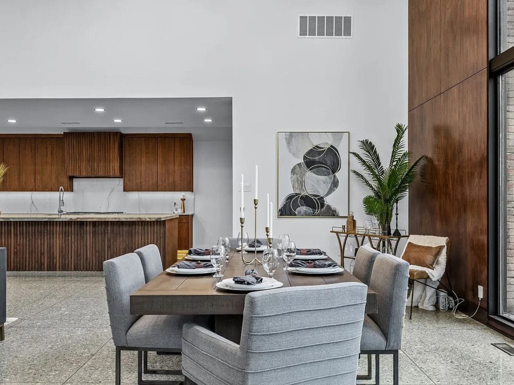 A recent meticulous redesign of the three bedroom home included removing a wall to create the effortless movement between the great room and the chef's kitchen. (Photo by Compass RE Texas)