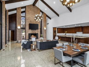 The restored parquet and terrazzo floors (pictured here) really shine. (Photo by Compass RE Texas)