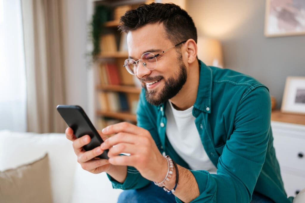 Who's got you smiling at your phone like that? Your wife might want to know. (Photo courtesy M. Ladin Balinovac)