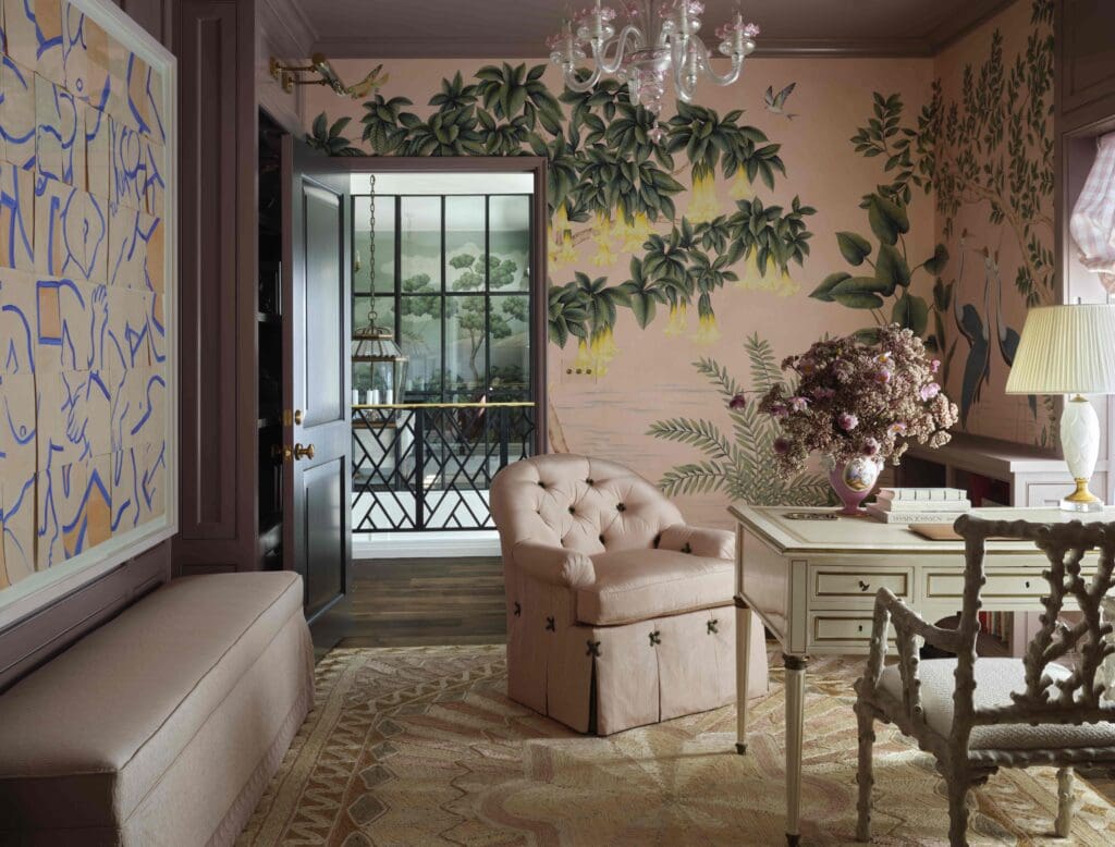 Catalina’s study with Patterson Flynn dusty rose abaca rug, de Gournay Colony wallpaper, chair by Marroquin Custom Upholstery in Colefax & Fowler pinstripe silk. Dennis & Leen coral-branch chair. (Photo by Douglas Friedman)