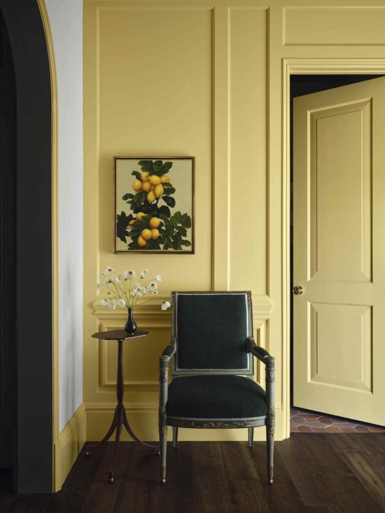 In a room used for entertaining, walls are painted Farrow & Ball Babouche. Edward A. Butler painting. (Photo by Douglas Friedman)