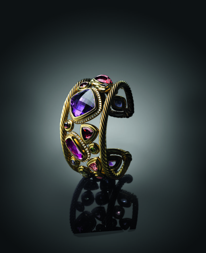 25th Anniversary Mosaic cuff with garnet, pink tourmaline, peridot, and pavé-set diamonds, 2011. (Photo by Raymond Meier)