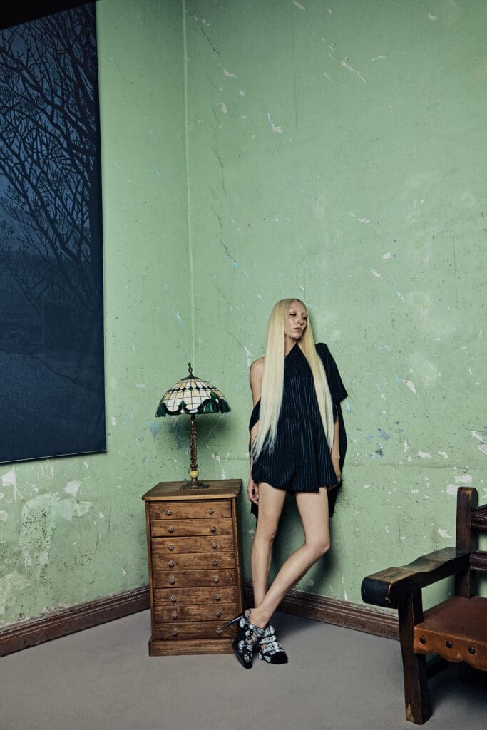 Louis Vuitton one-shoulder asymmetric dress $5,100, and Legacy slingback pump $2,010. (Photo by Bryan Flores)