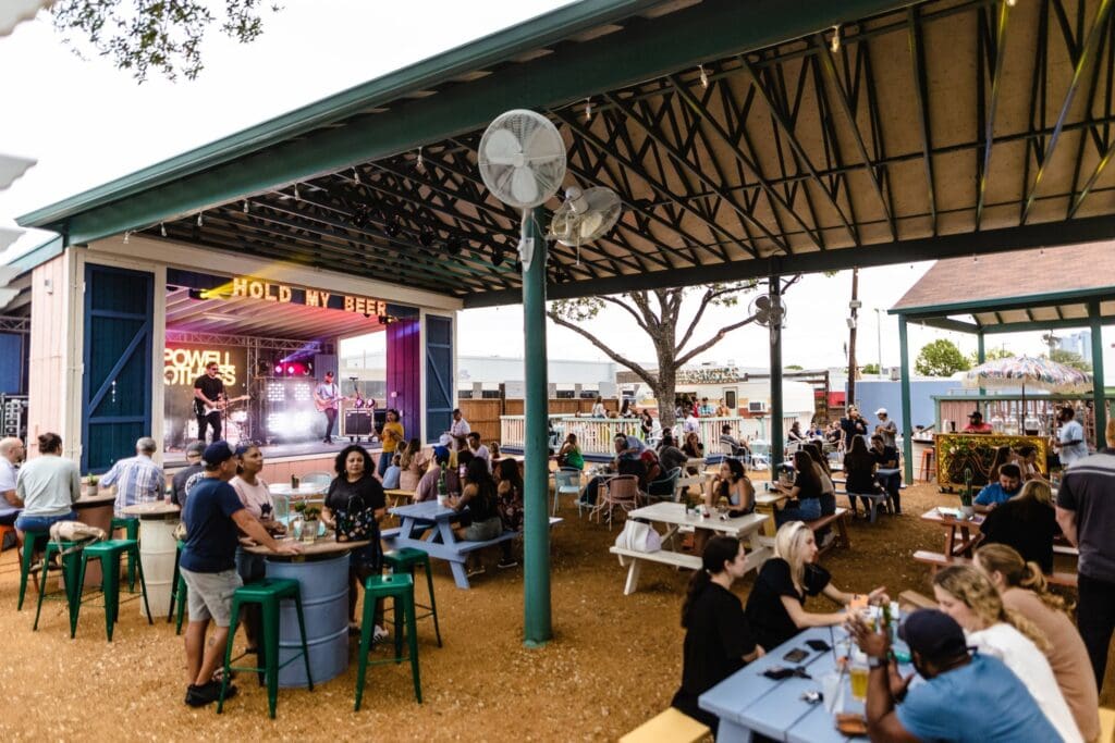 Birdie's Social Club brings big backyard energy to West 7th with dogs fully in the mix. (Courtesy)