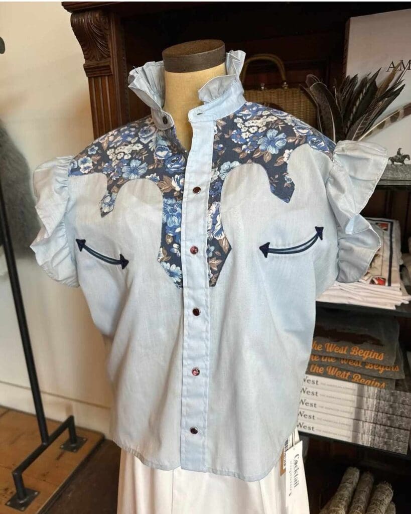 Western wear is getting a modern refresh, thanks to brands like Le Spur, which transforms vintage pearl snap shirts into ruffle tops.