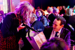 Andrew Rosen during the live auction. (Photo by nbarrett photography)