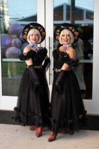 Cowgirls set the scene for Rhinestone Cowboys theme; Photo Credit Wilson Parish