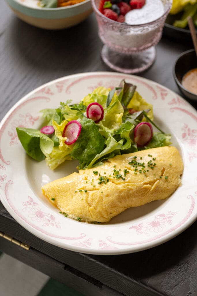 The French omelette at Le PasSage. comes with an addictive French Boursin cheese. (Photo by Beckley)