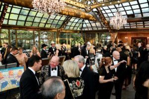 Guests mingling during cocktail hour in The Bryan Museum’s Conservatory; Photo Credit Dave Rossman