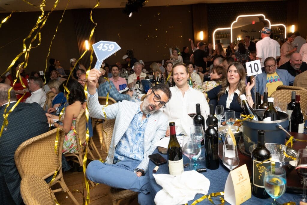 Hector Torres bidding at the Southern Smoke Foundation 'Decanted' fundraiser (Photo by Daniel Ortiz)