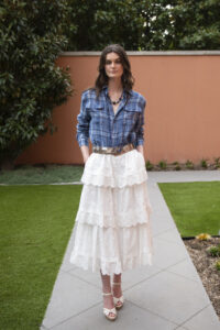 If I could choose one piece from the collection, I'd select the Caitlin Tiered Embroidered Cotton Poplin Midi Skirt ($2,990) for its timeless versatility. (Photo by Tamytha Cameron)