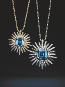 Starburst Collection one-of-a-kind yellow and white gold and pavé-set diamond pendant necklaces with aquamarines, 2023. (Photo by Emil Larsson)
