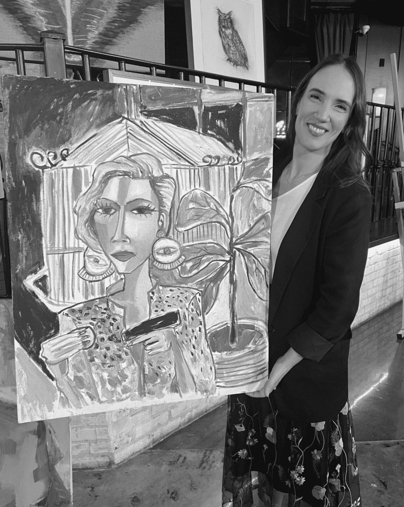 Sharon Lott Graham with a work by Cruz Ortiz at Rothko Chapel Inspirit Dinner (Photo by Catherine D. Anspon)