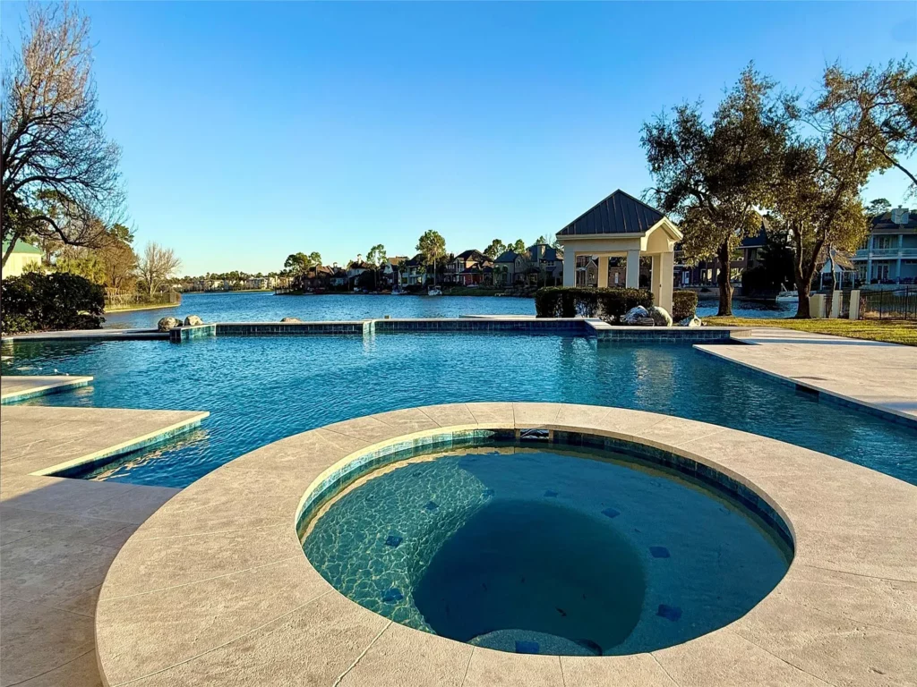 Relax in the pool and take in stunning views at 10 W Isle Pl. 