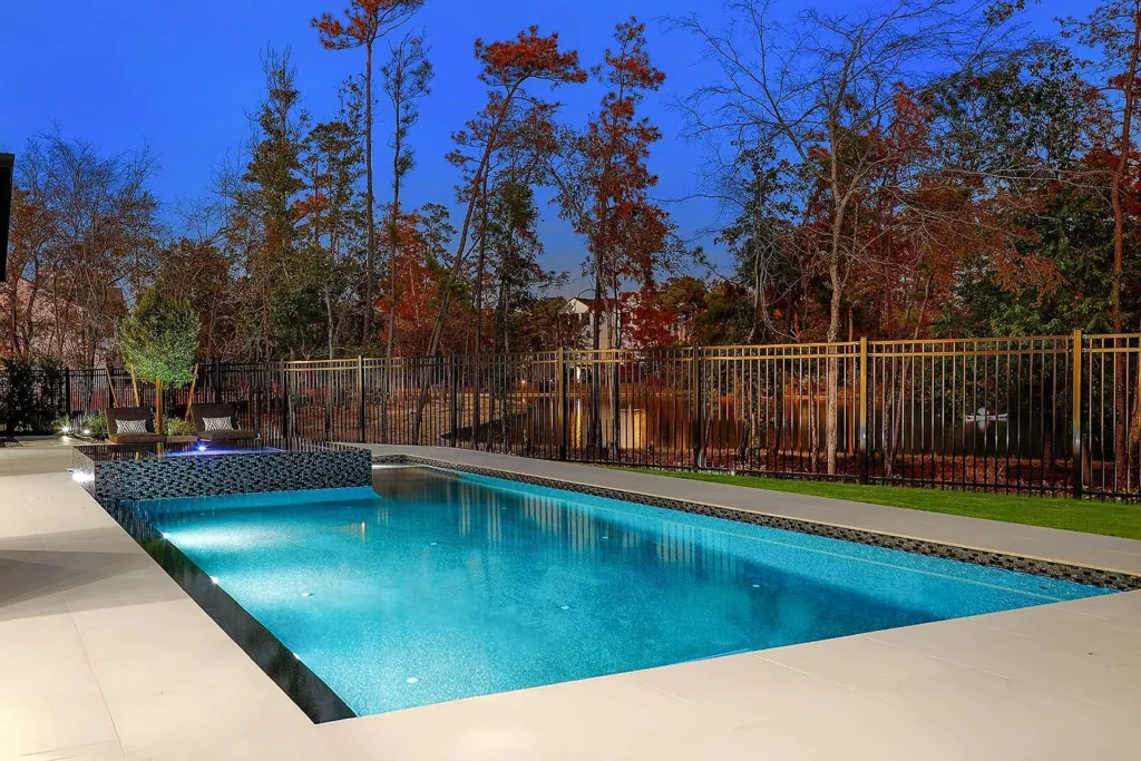 Enjoy taking a dip at any time of day with underwater lights that make the pool at 38 Aria Isle Dr shine. 