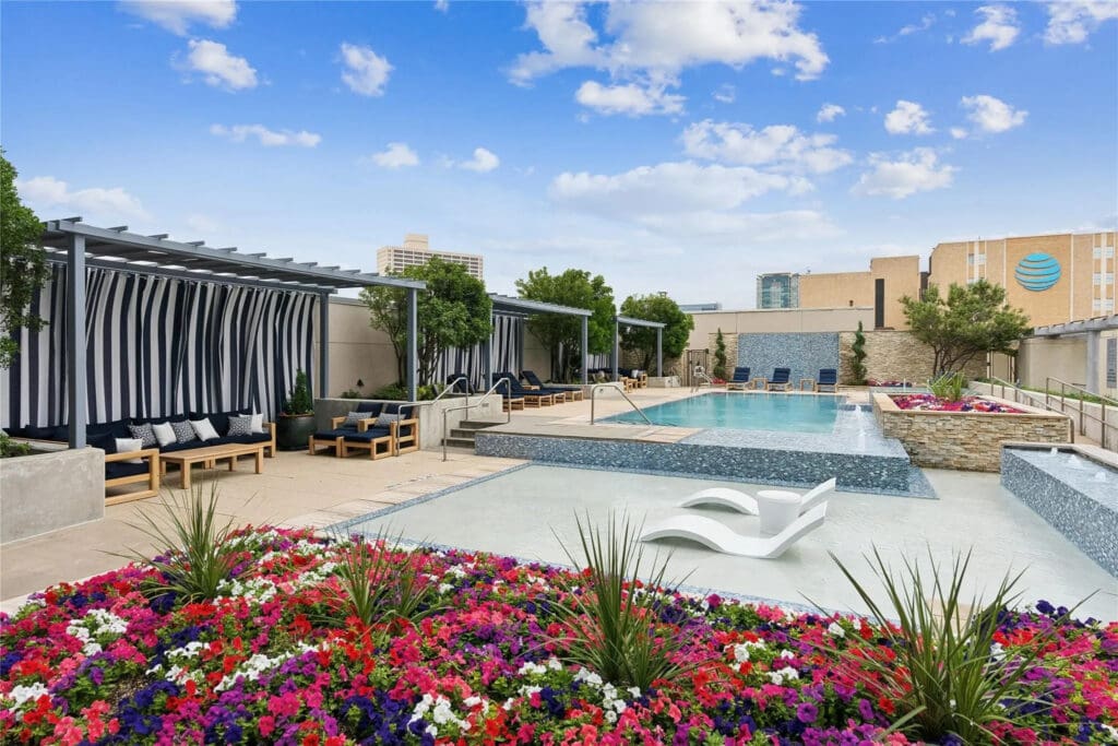 Residents at Omni enjoy exclusive access to a rooftop pool, a private fitness center, and 24-hour concierge services.