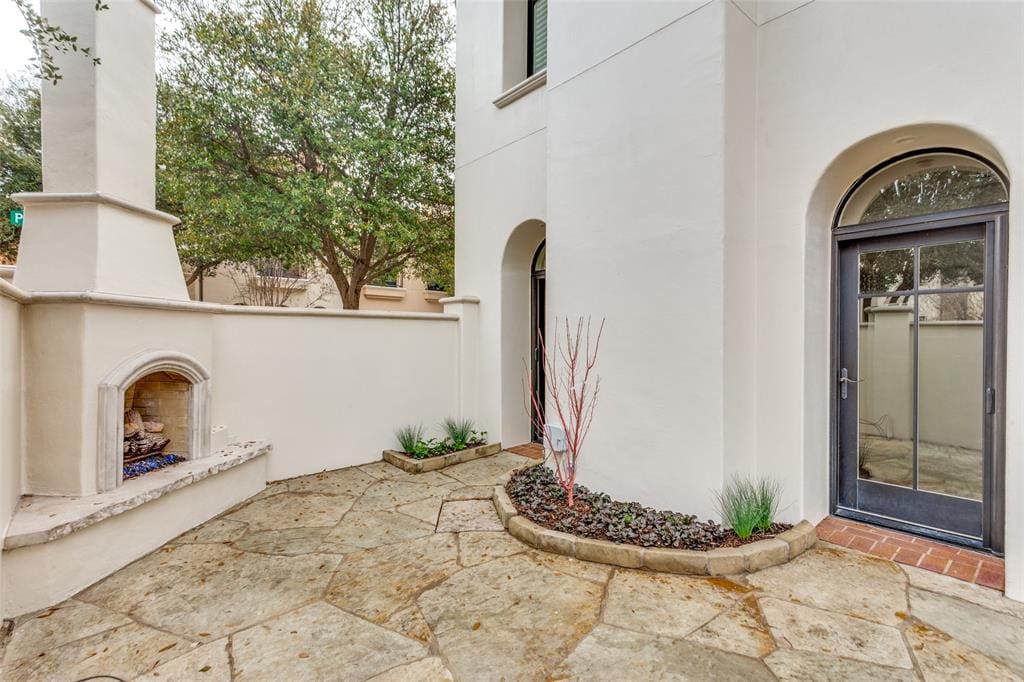 2701 Calder Court offers outdoor space with a fireplace. 