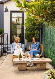 2 – Founder Julie Rhyne and Daughter Lauren Van Wagenen outside The Cottage Grocery River Oaks; Photo courtesy of Julie Soefer Photography (Photo by Julie Soefer)