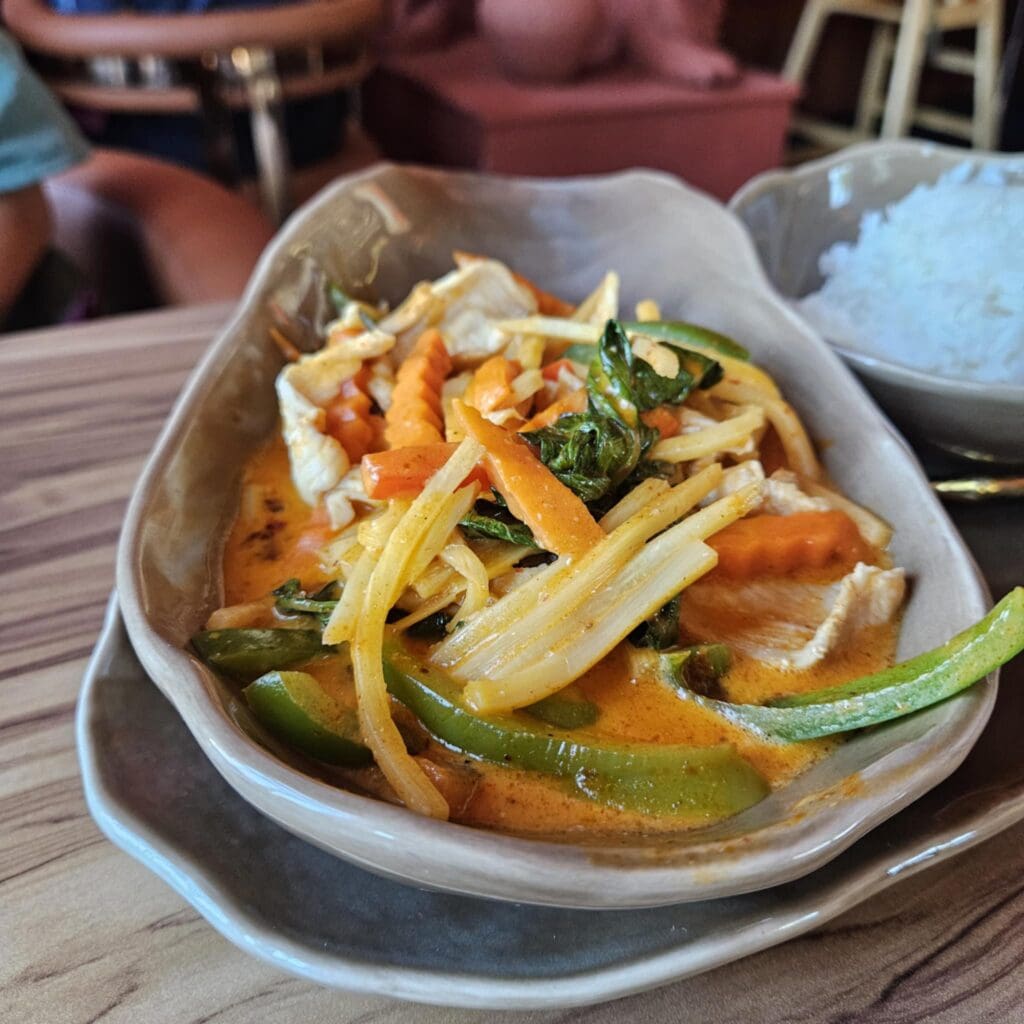KO Thai delivers vibrant Thai street food in a stylish space accented with warm wood and red clay. (Photo by Edward Brown)