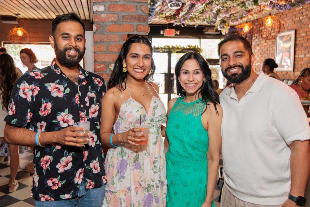 Calvin John, Joyce Varghese, Shelly Razzak, Farhan Charania at the Dress for Success Women of Wardrobe Spring Fling. 