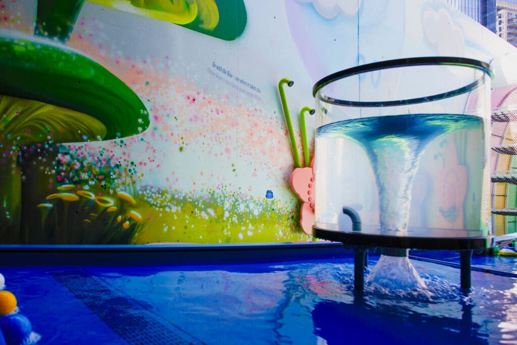 The enlarged outdoor area with organic play elements (Photo by John Smith)