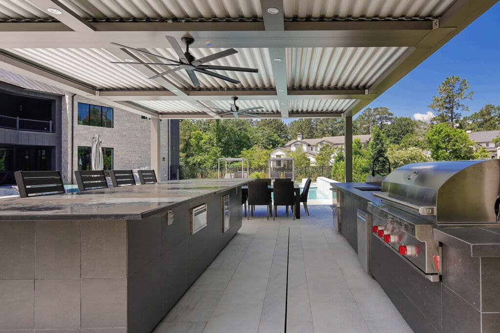 The outdoor kitchen area has a retractable roof to keep diners dry or shaded, but can let the sun shine in when the weather is nice.