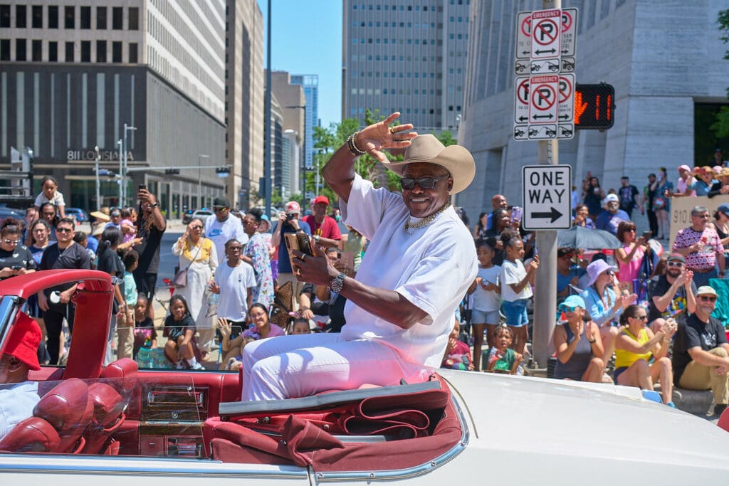 Grand Marshal Carl Lewis at The Orange Show 38th Annual Art Car Parade (Photo by Charlie Ewing)