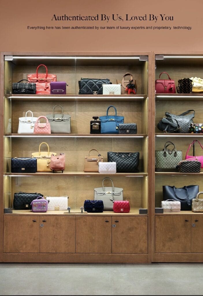 A wall of designer bags lines one side of Houston's new RealReal store.