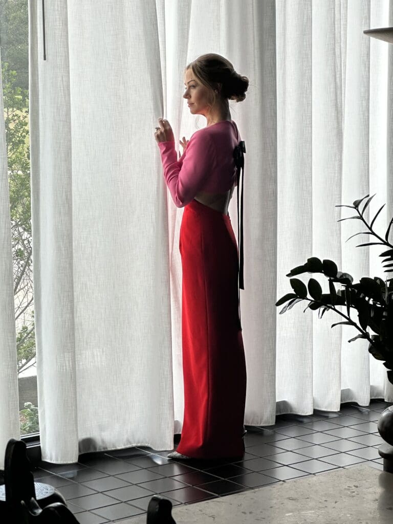 A stunning portrait of Lexi Sakowitz Marek wearing Carolina Herrera for the PaperCity Philanthropy in Fashion Best Dressed photo shoot shows off her style. (Photo by Shelby Hodge)