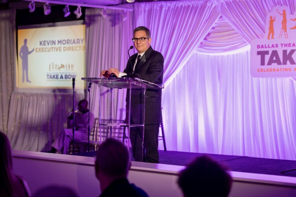 Kevin Moriarty presents to Joel Ferrell (Photo by Thomas Garza and Tamytha Cameron)