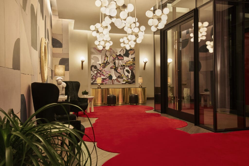 The lobby welcomes you to a hotel, but also an art experience.