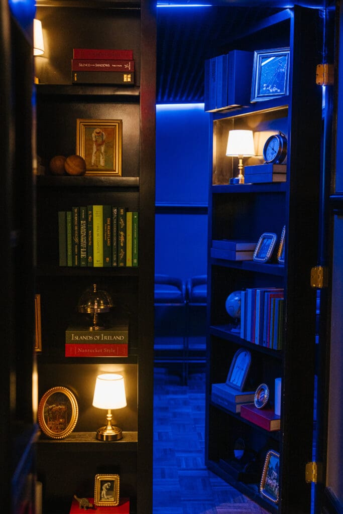 Stewart's Croquet & Cocktails features a private dining room located through a secret bookcase. (Photo by Zach Simmons)