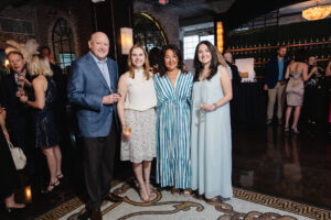 Tim Neumann, Kara Neumann, Paulina McGrath and Anna McGrath by Johnny Than