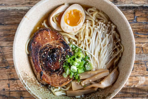 Wabi House channels izakaya culture with bold small plates and standout ramen in a relaxed, wood-toned space. (Courtesy)