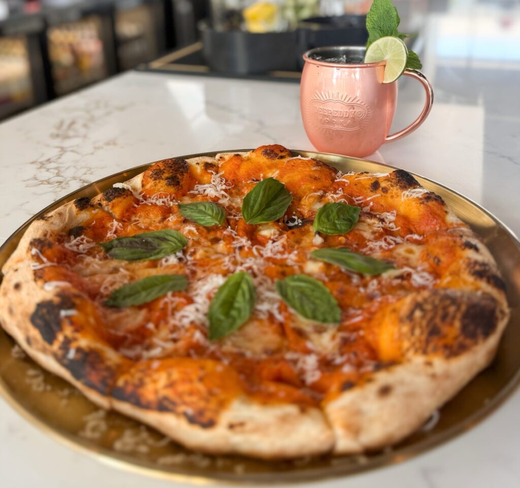 Pair your cocktail with a scratch-made pizza at River's. (Courtesy)