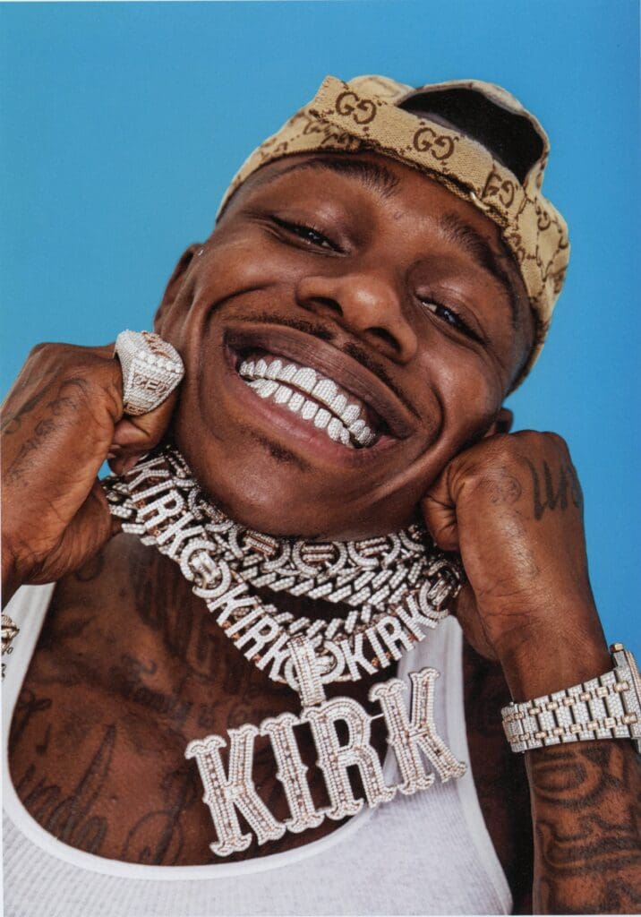 DaBaby in diamond grillz, custom Kirk chain and links by Johnny Dang & Co., 2019 (From "Ice Cold: A Hip-Hop Jewelry History" by Vikki Tobak, Taschen, © 2022. Photo by Meredith Jenks)