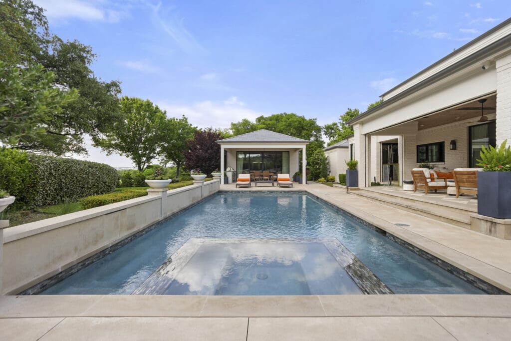 A heated pool and spa anchor the backyard, where a fully appointed guest cabana offers additional living space with panoramic golf course views. (Courtesy)