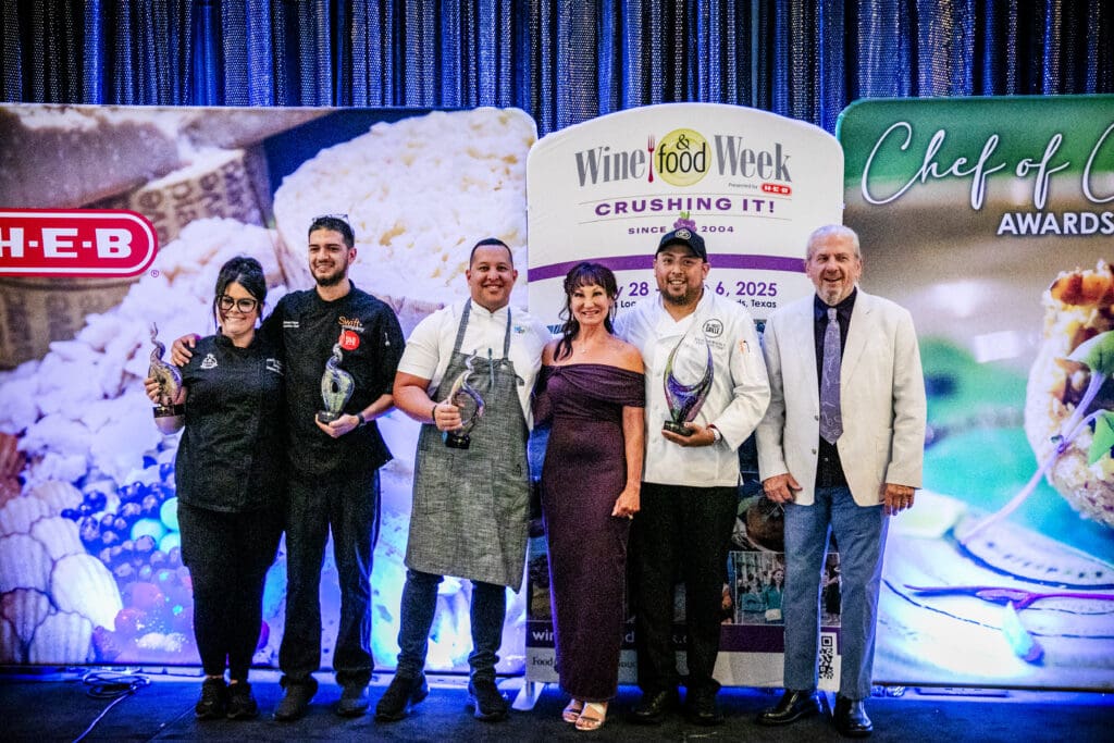 Constance and Clifton McDerby celebrate with all the winners in the Grand Tasting and Chef Showcase at The Woodlands Waterway Marriott. (Photo by Food and Vine Time Productions)