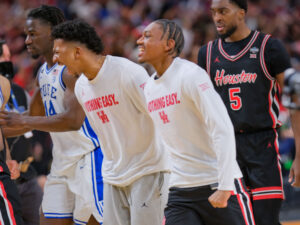 University of Houston Cougars men’s basketball team opened their 2021-2022 season with an overtime victory over the HofstraPride, complete with the presentation of a banner commemorating their trip to last season’s Final Four, Tuesday night at the Fer