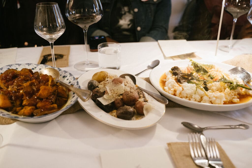 All-star dishes prepared by Chef Dominick Lee is served to guests at Sips & Saddles: Supperclub Dinner at Hotel King Henry (Photo by NYC High Photography)