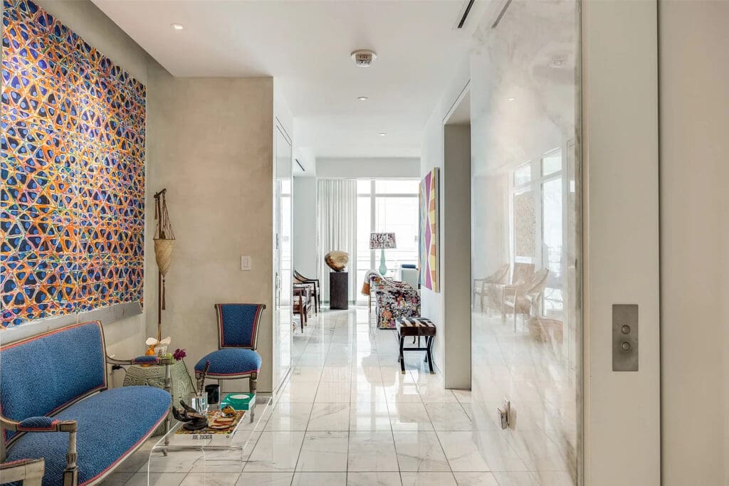 A private elevator delivers our swan directly to her unit. (Photo by Compass RE Texas)