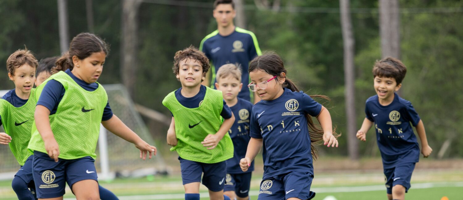 Boys and girls learn soccer skills in Houston’s Global Football Innovation programs. (Photo by Juanita Moreno)