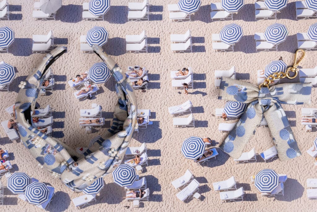 Locations featured include Maui, Miami's South Beach, Waikiki Beach, and Provence. (Photo courtesy of Gray Malin)